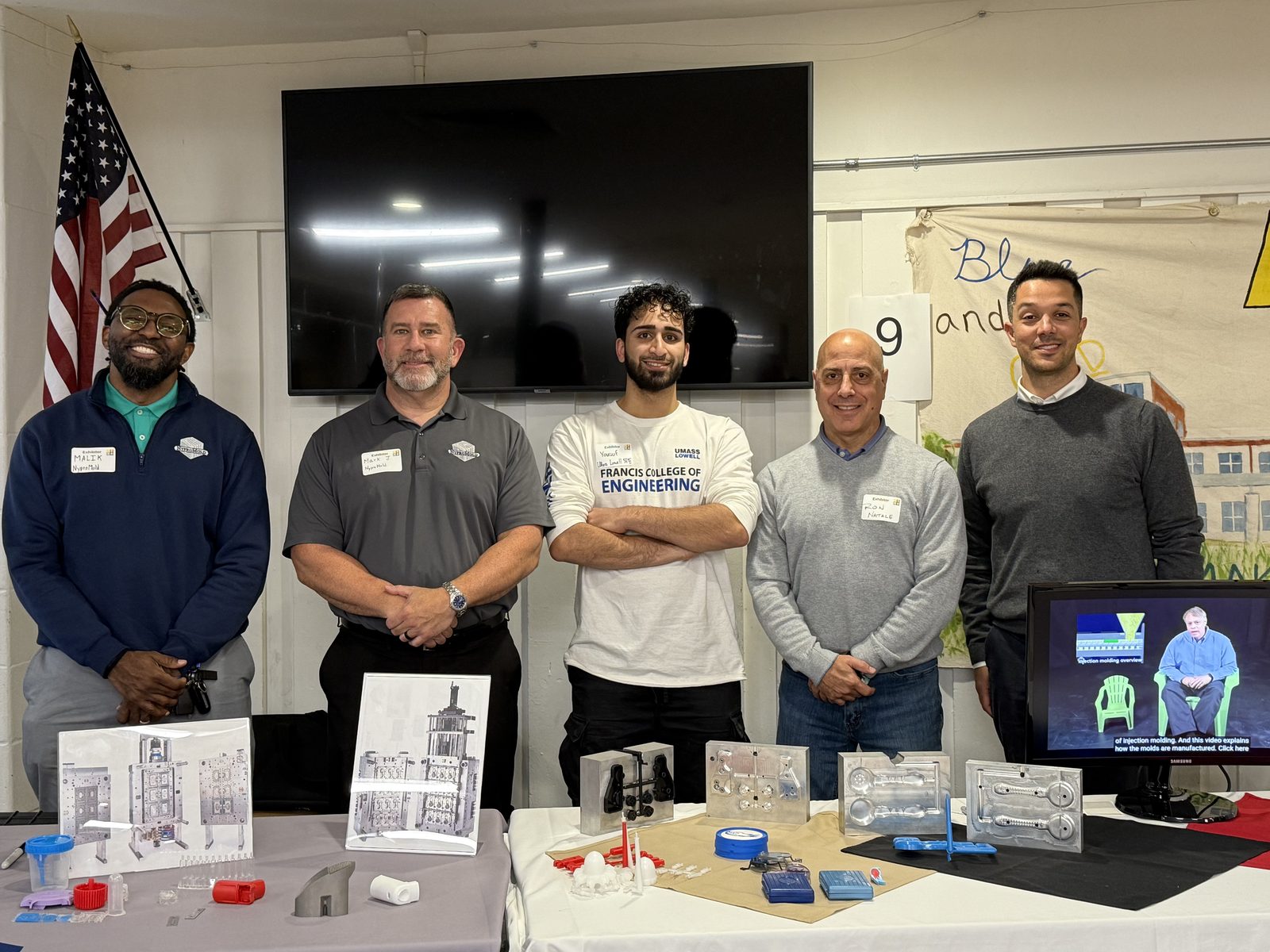 NyproMold staff and a UMass Lowell SPE Student Chapter member at the MTD exhibit table