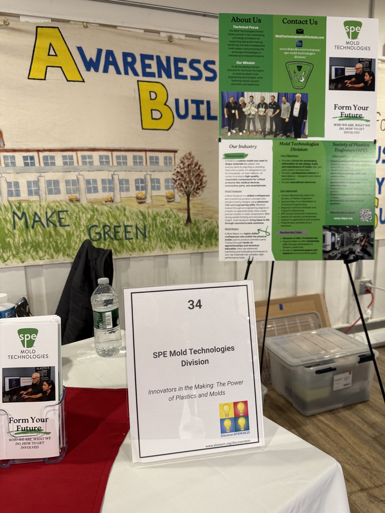 MTD informational poster at the DiscoverSTEM booth explaining what a mold is and what the division does