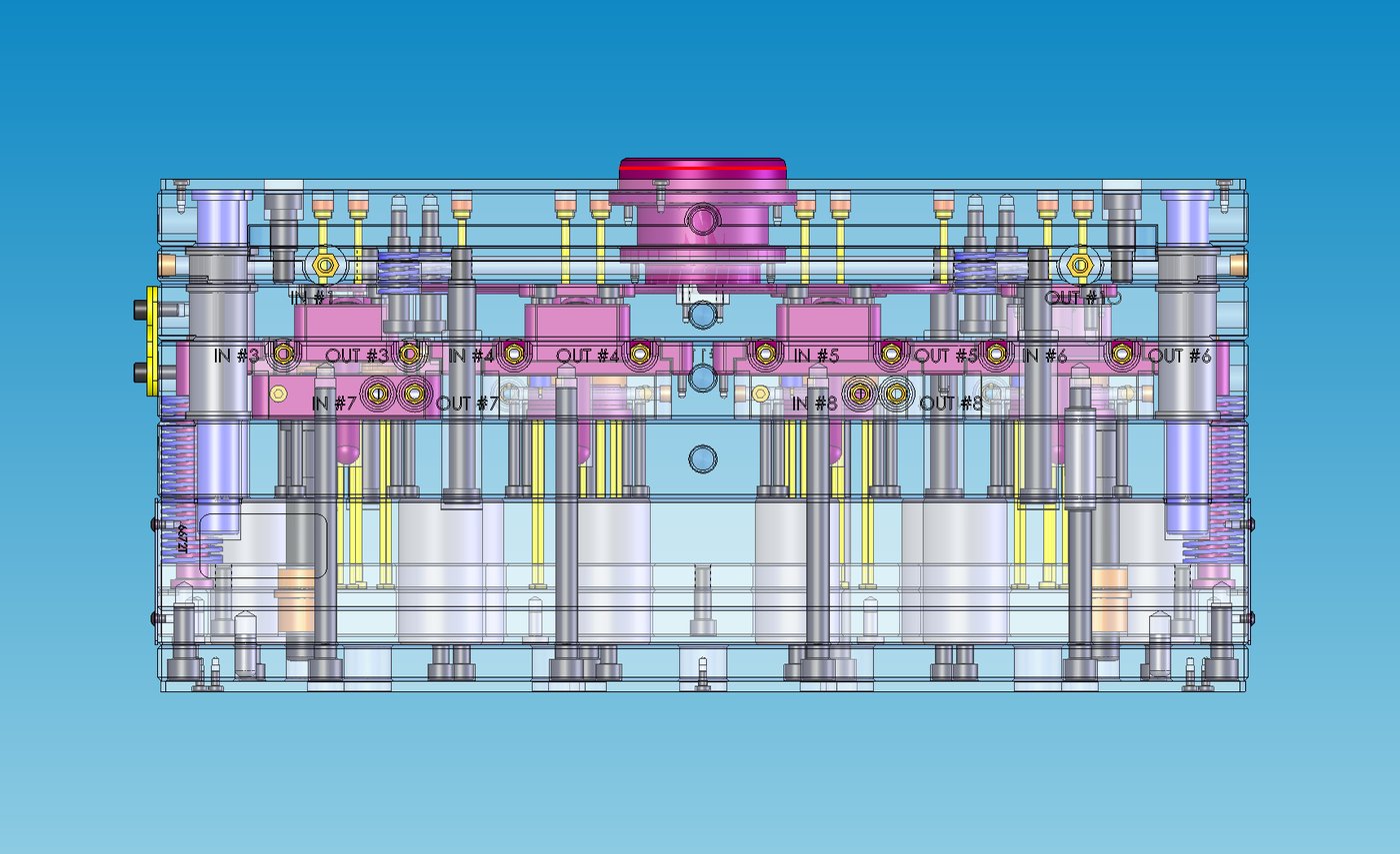 Cross-section CAD rendering of a mold tool showing labeled cooling channel inlets and outlets